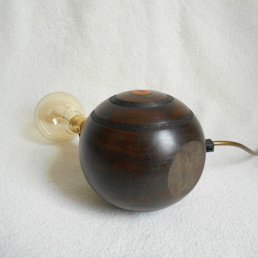 A pair of vintage wooden bowling balls by Fiona Bradshaw Designs