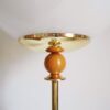 A vintage brass floor lamp with a large glass dome by Fiona Bradshaw Designs