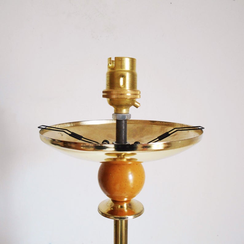 A vintage brass floor lamp with a large glass dome by Fiona Bradshaw Designs