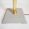 A vintage brass floor lamp with a large glass dome by Fiona Bradshaw Designs