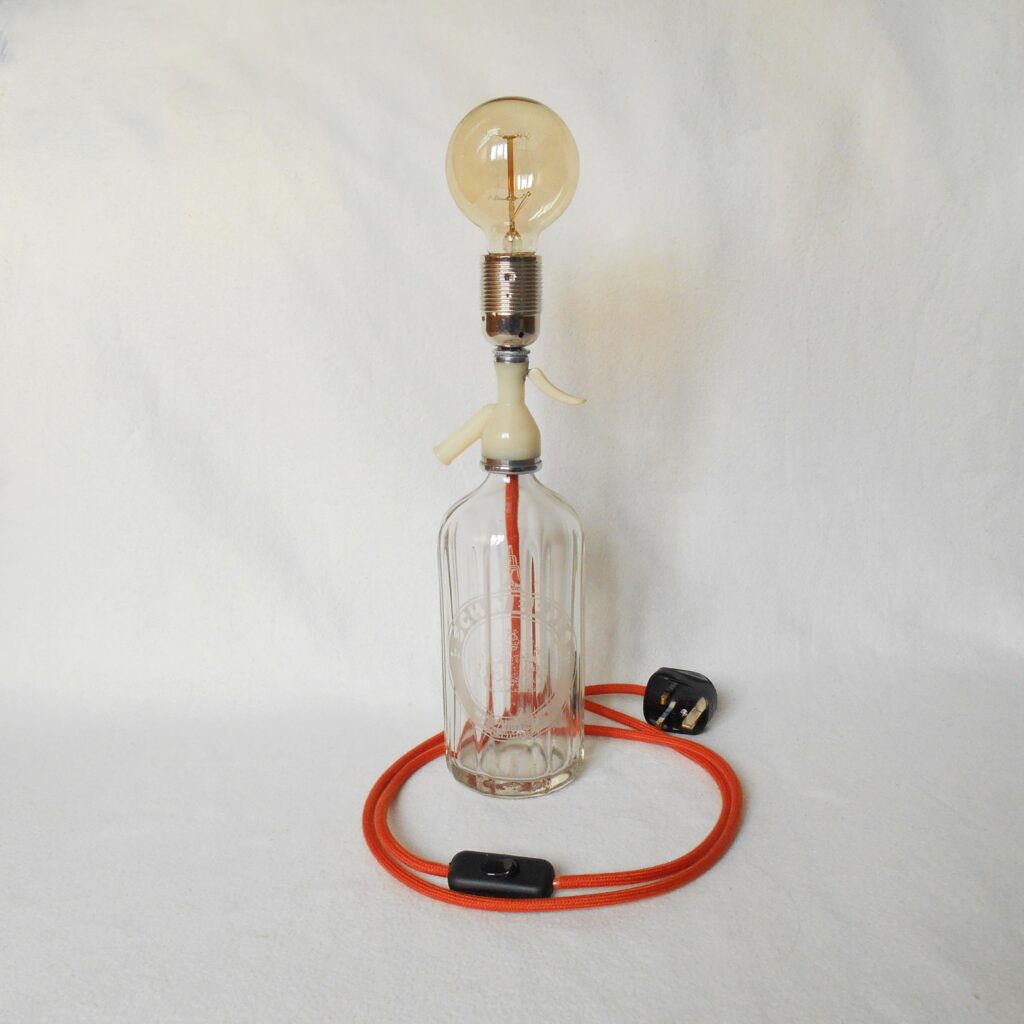 Vintage soda syphon lamp with a zingy orange braided cable by Fiona Bradshaw Designs