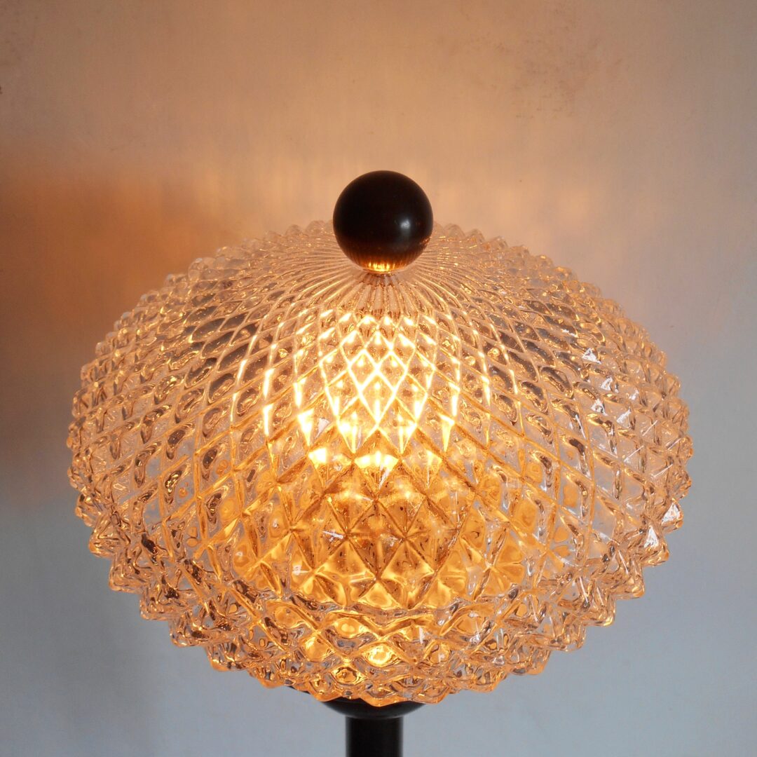 A unique floor lamp with black and gold features & a cut glass dome shade by Fiona Bradshaw Designs