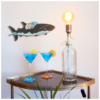 A vintage soda syphon repurposed into a unique table lamp by Fiona Bradshaw Designs