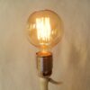 A vintage soda syphon repurposed into a unique table lamp by Fiona Bradshaw Designs