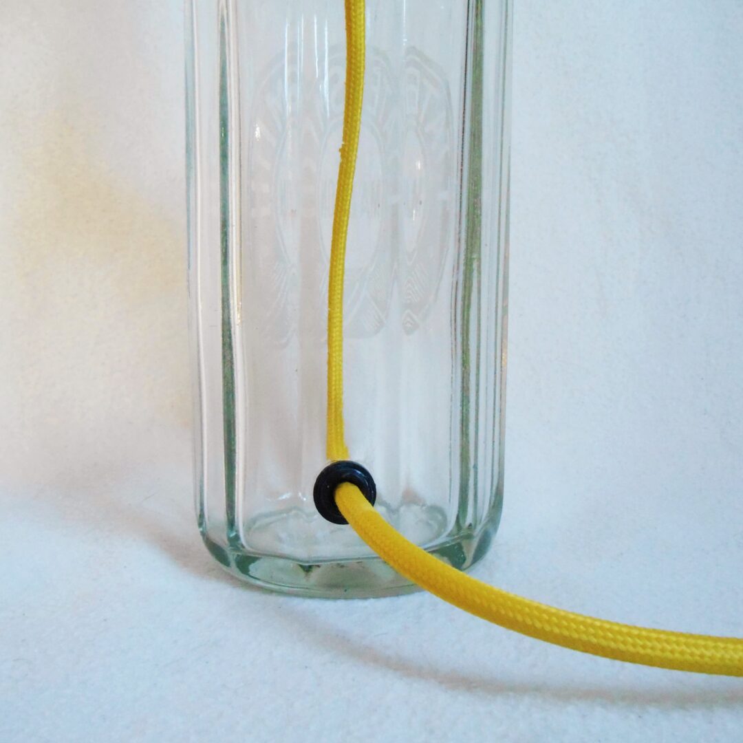 Vintage soda syphon lamp with a yellow braided cable by Fiona Bradshaw Designs
