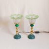 A pair of Art Deco style lamps with frilly green glass shades by Fiona Bradshaw Designs