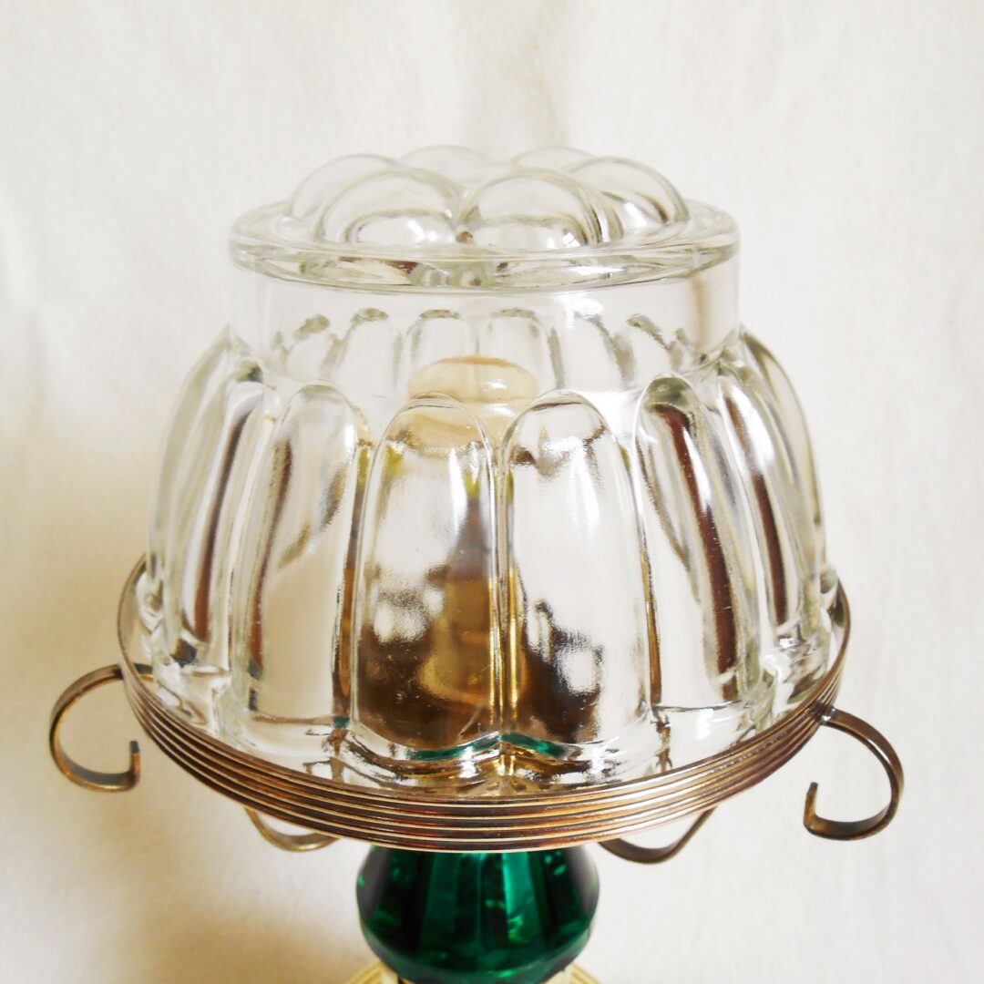 A vintage brass table lamp with a jelly mould shade by Fiona Bradshaw Designs