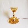 Amber cut glass table lamp with unique decorative brass features by Fiona Bradshaw Designs