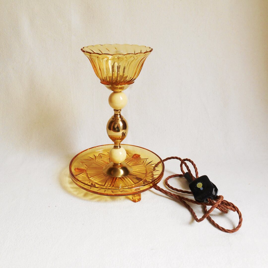 Amber cut glass table lamp with unique decorative brass features by Fiona Bradshaw Designs