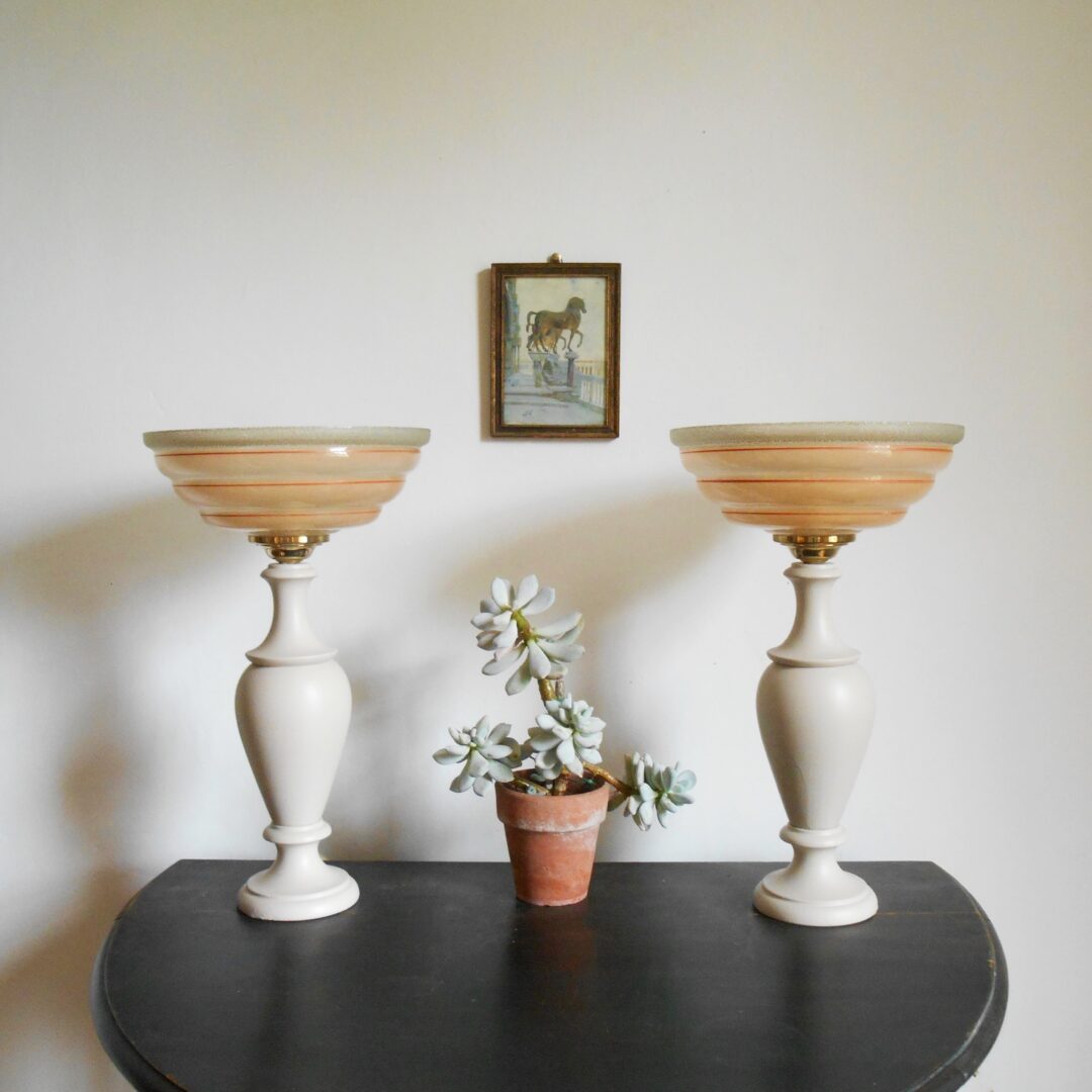 A pair of Art Deco elegant marble table lamps with peachy glass shades by Fiona Bradshaw Designs