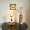 Amber cut glass table lamp with unique decorative brass features by Fiona Bradshaw Designs