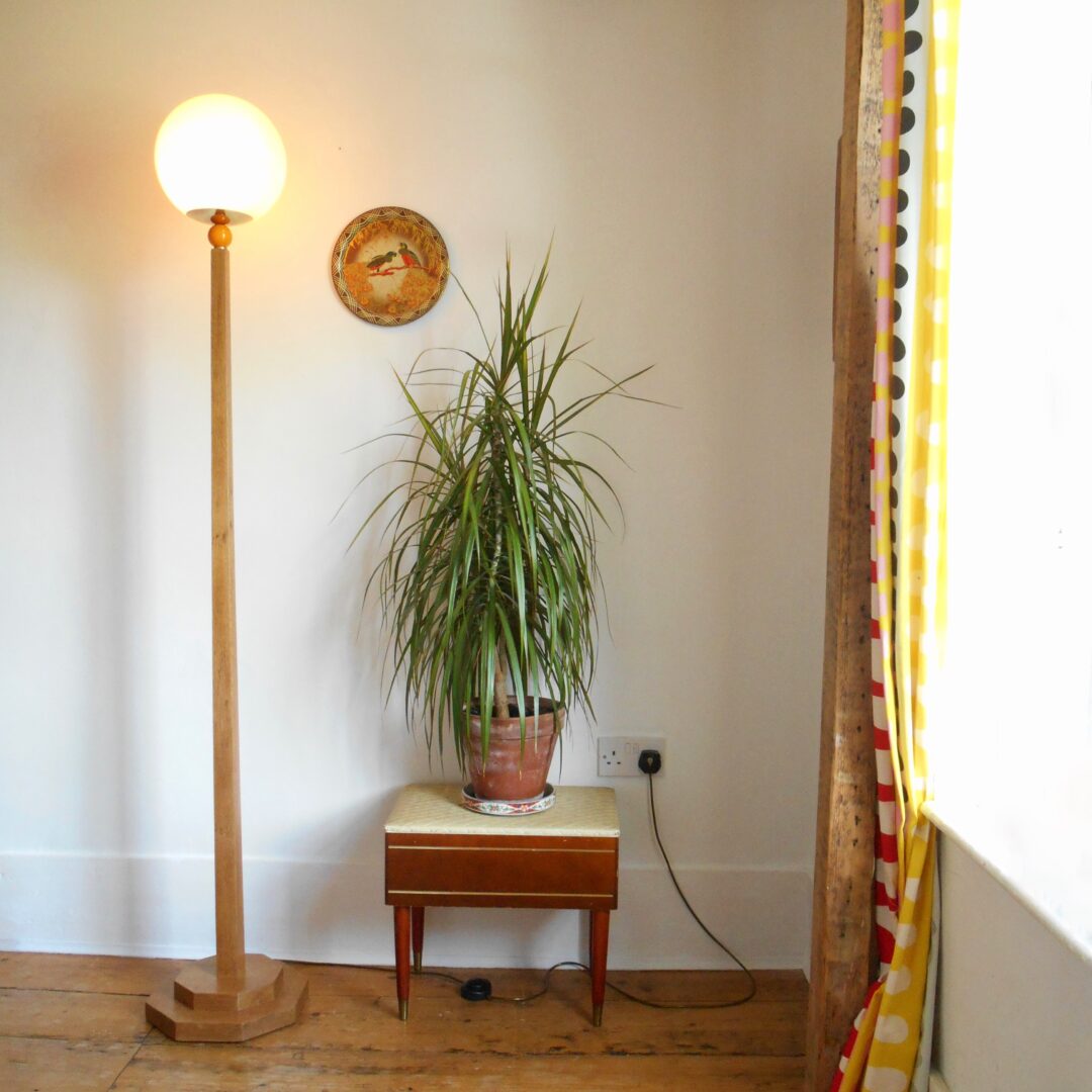 A vintage octagonal oak floor lamp with a glass domed shade by Fiona Bradshaw Designs