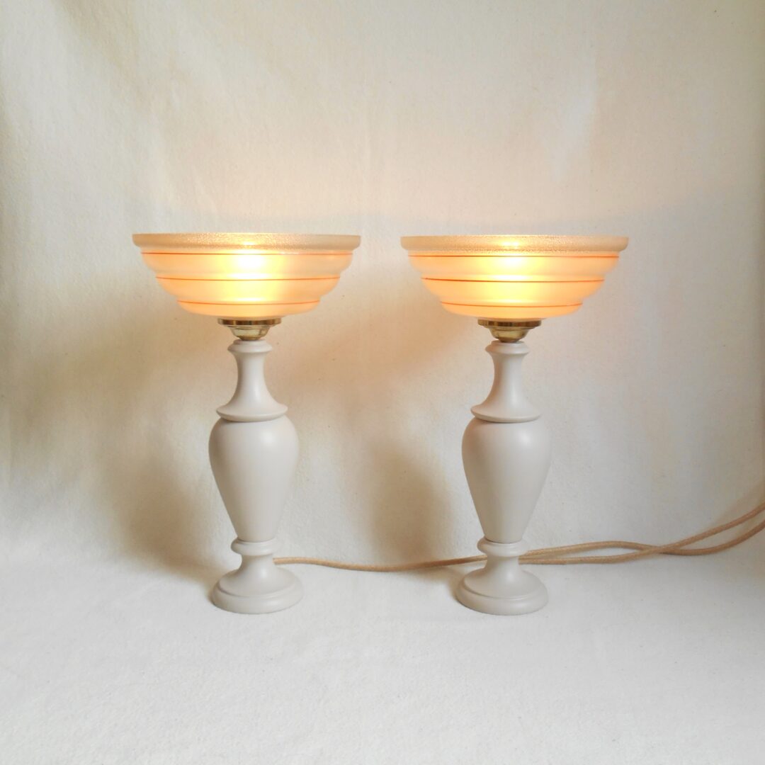 A pair of Art Deco elegant marble table lamps with peachy glass shades by Fiona Bradshaw Designs