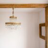 Antique five tier crystal chandelier by Fiona Bradshaw Designs