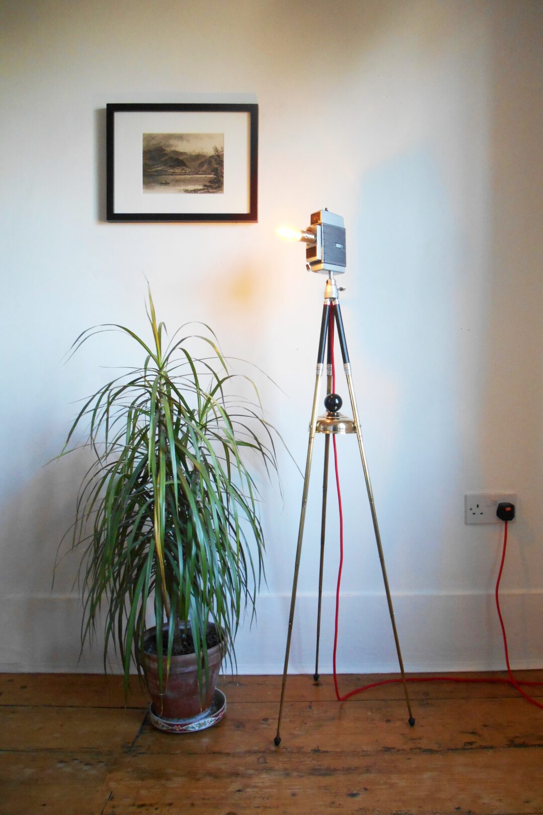 A cine cameras tripod floor lamp by Fiona Bradshaw Designs