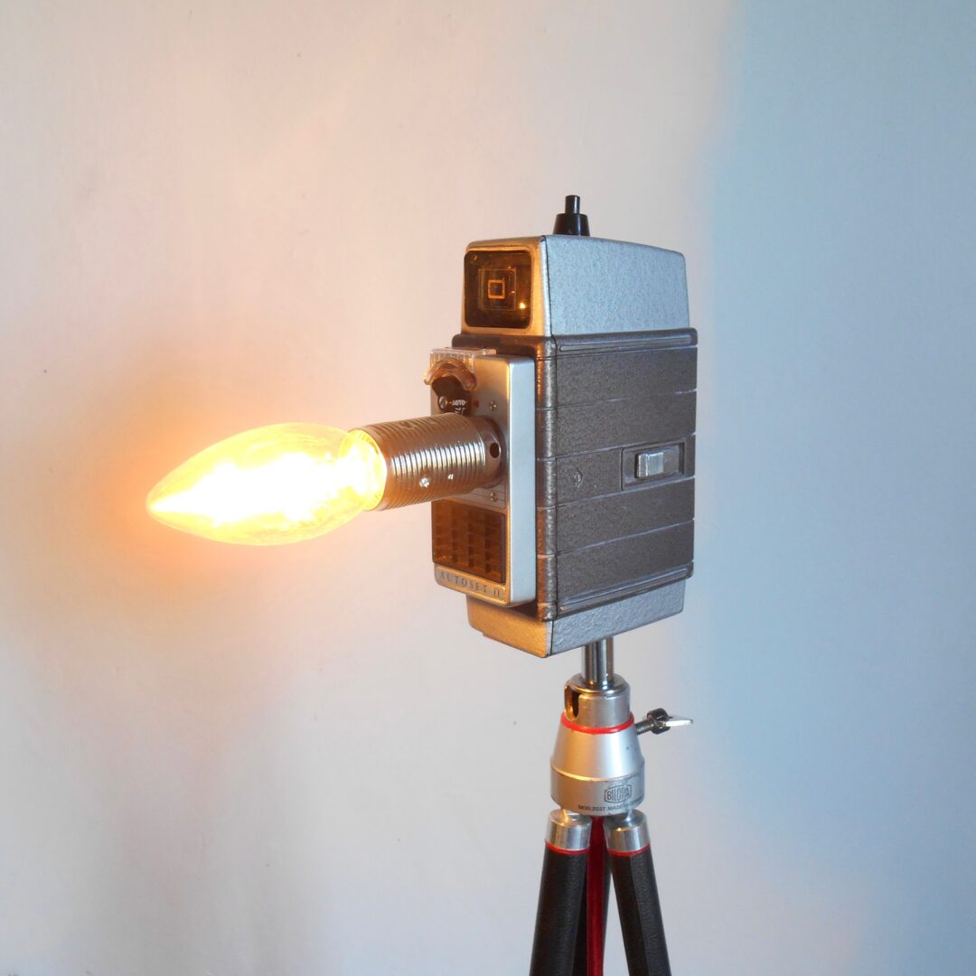 A cine cameras tripod floor lamp by Fiona Bradshaw Designs