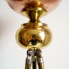 An antique brass tripod floor lamp by Fiona Bradshaw Designs