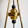 An antique brass tripod floor lamp by Fiona Bradshaw Designs