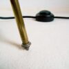 An antique brass tripod floor lamp by Fiona Bradshaw Designs