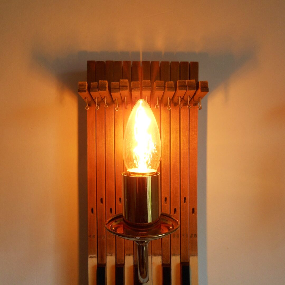 Repurposed wall lamp with antique piano keys by Fiona Bradshaw Designs