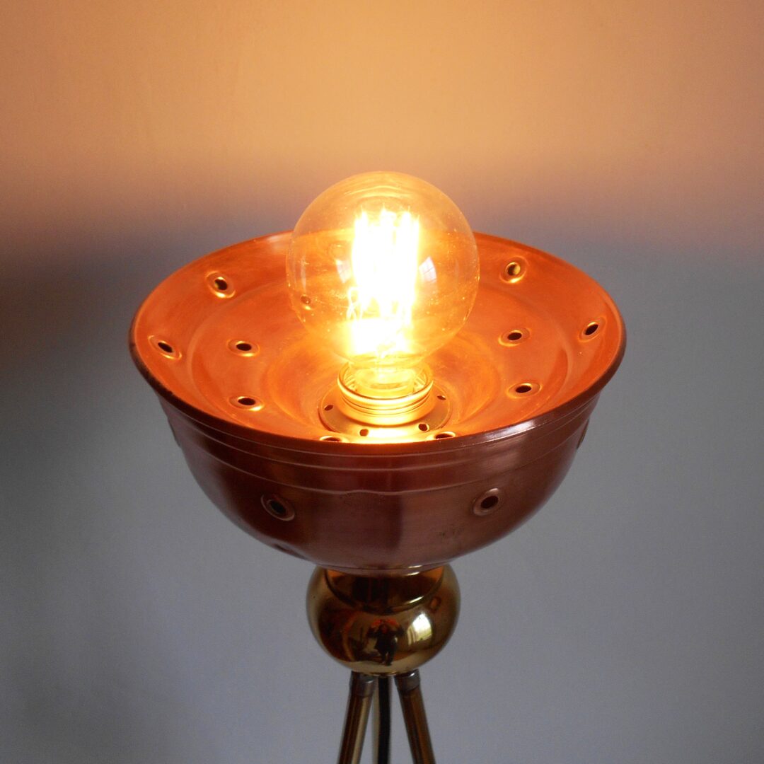 An antique brass tripod floor lamp by Fiona Bradshaw Designs
