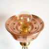 An antique brass tripod floor lamp by Fiona Bradshaw Designs