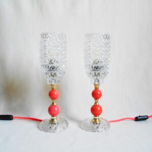 A pair of cut glass table lamps with neon pink features by Fiona Bradshaw Designs