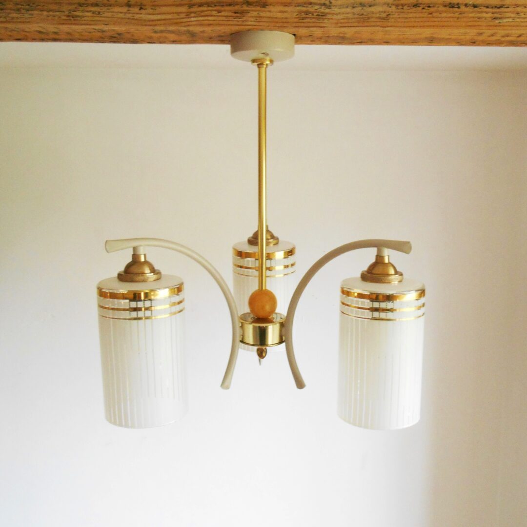 An Art Deco style unique chandelier with three cylindrical shades by Fiona Bradshaw Designs