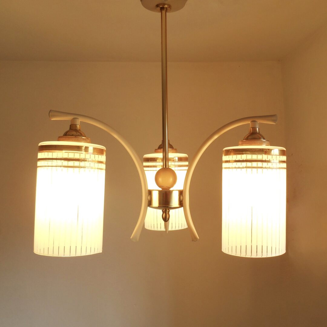 An Art Deco style unique chandelier with three cylindrical shades by Fiona Bradshaw Designs