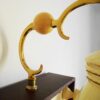 A vintage record player repurposed into a unique wall lamp by Fiona Bradshaw Designs