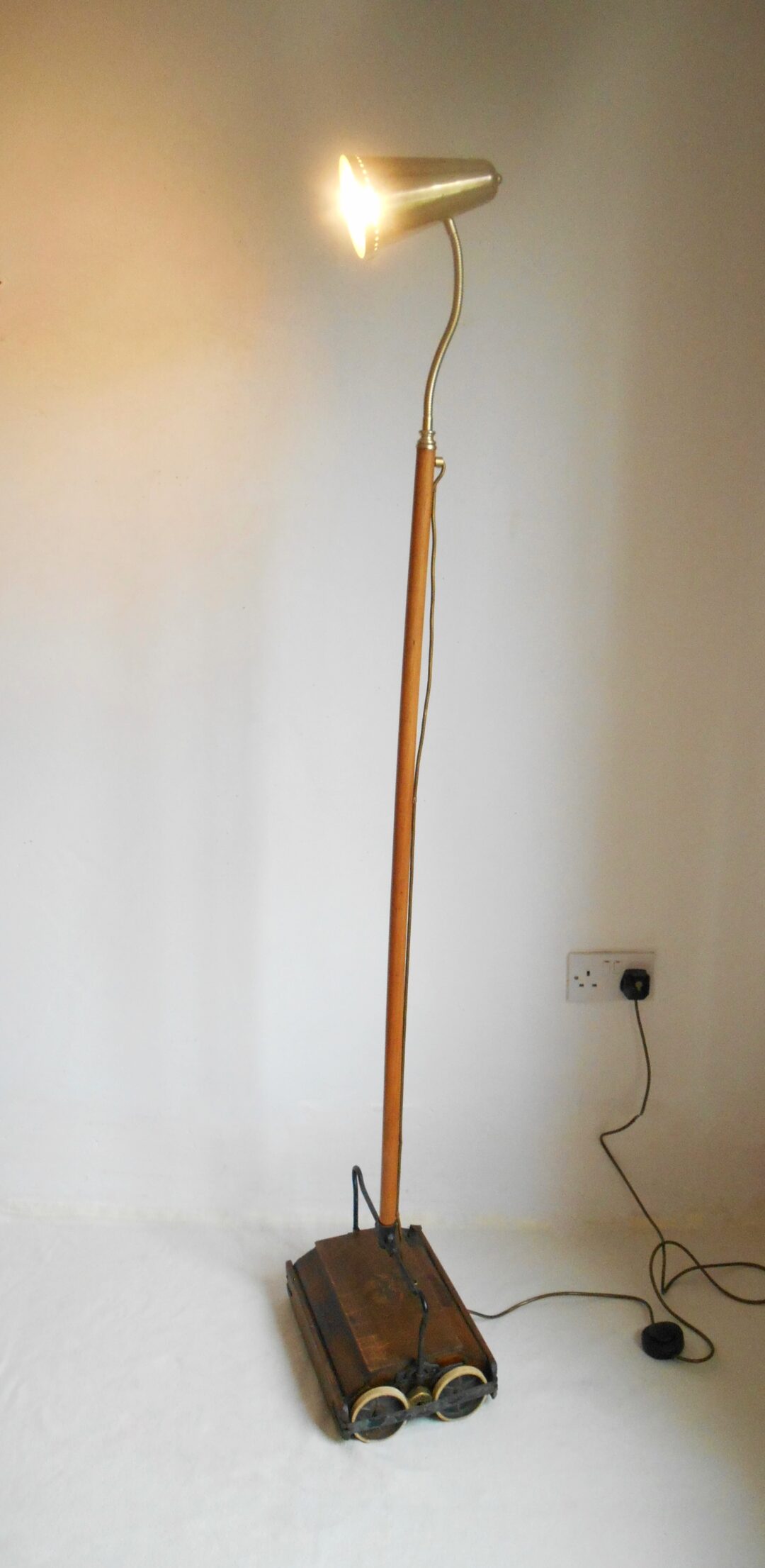 A Ewbank adjustable floor lamp by Fiona Bradshaw Designs