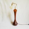 A vintage teak and amber tall table lamp by Fiona Bradshaw Designs
