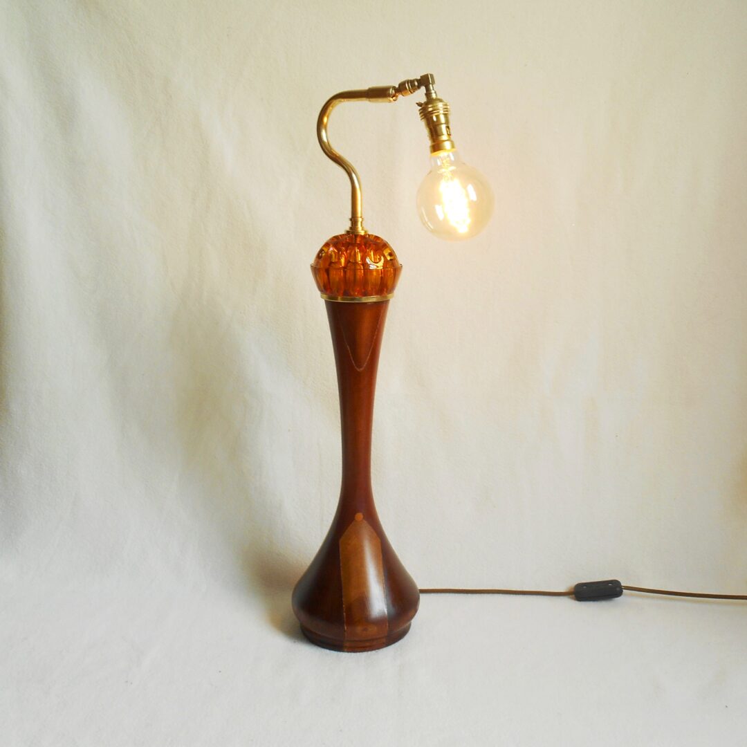 A vintage teak and amber tall table lamp by Fiona Bradshaw Designs