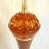 A vintage teak and amber tall table lamp by Fiona Bradshaw Designs