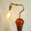 A vintage teak and amber tall table lamp by Fiona Bradshaw Designs
