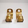 A pair of curved brass vintage wall lamps by Fiona Bradshaw Designs