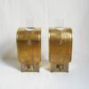 A pair of curved brass vintage wall lamps by Fiona Bradshaw Designs