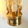 A pair of curved brass vintage wall lamps by Fiona Bradshaw Designs
