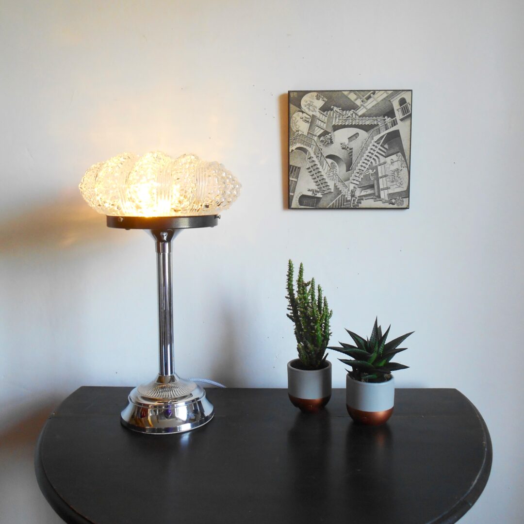 A bubble glass table lamp with a silver chrome base and stem by Fiona Bradshaw Designs