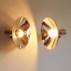A pair of vintage photographers adjustable wall lamps by Fiona Bradshaw Designs