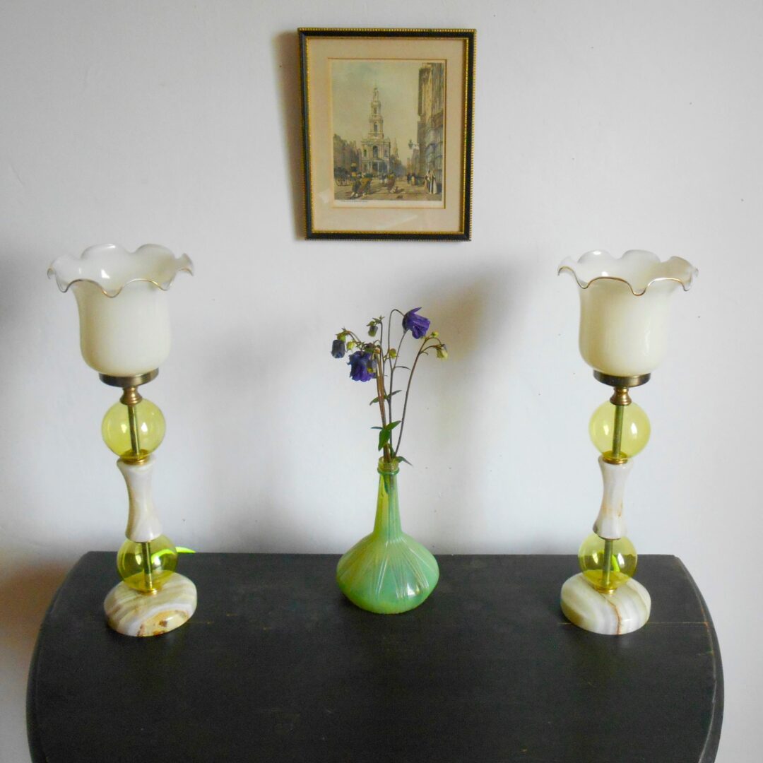 A pair of lime marble table lamps with neon yellow cables by Fiona Bradshaw Designs.