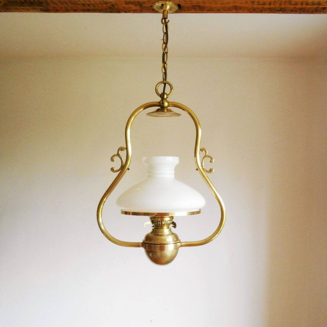 An antique solid brass pendant lamp by Fiona Bradshaw Designs