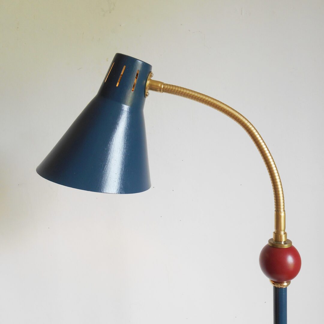A vintage tricycle repurposed into a floor lamp by Fiona Bradshaw Designs