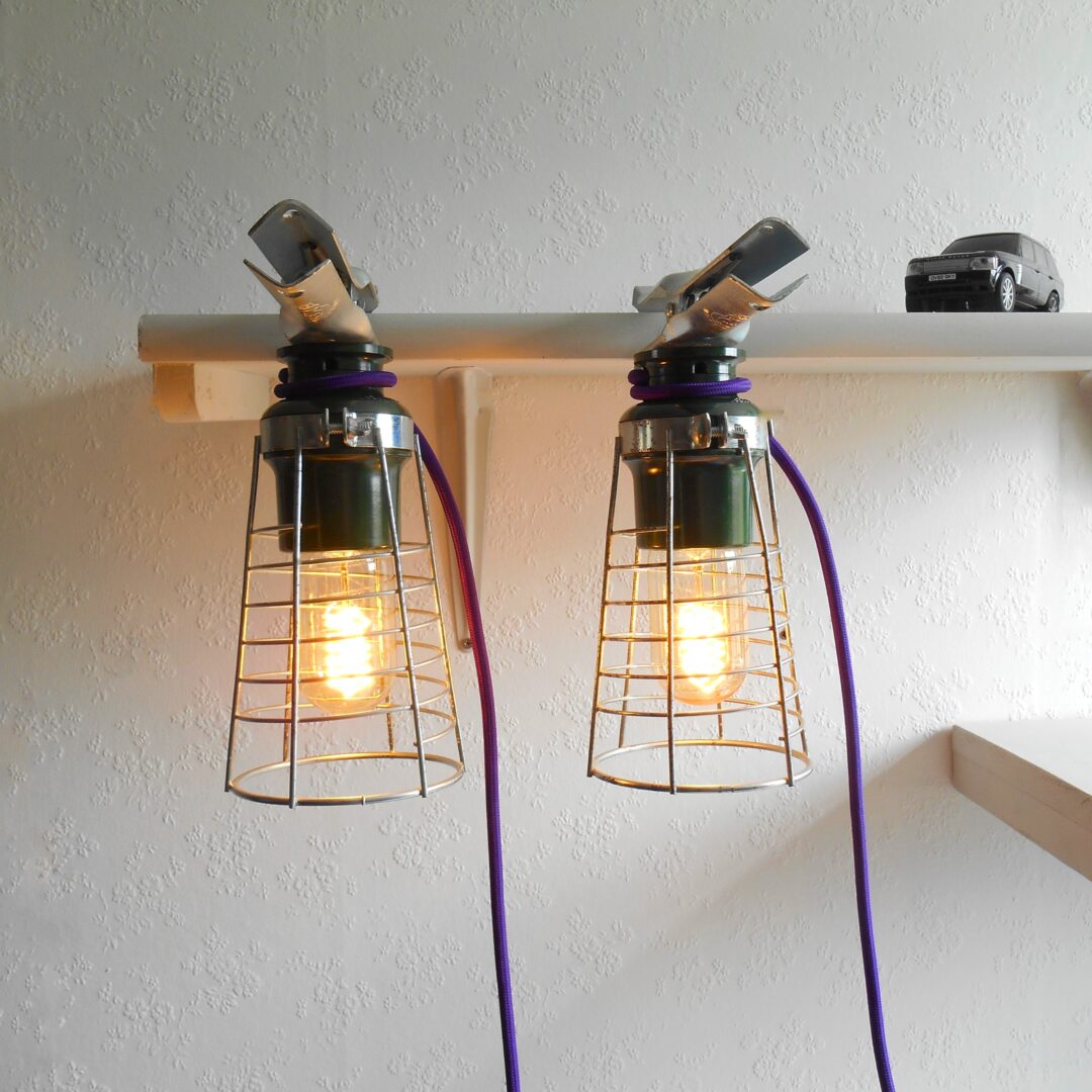 A pair of vintage gripper wall lamps by Fiona Bradshaw Designs