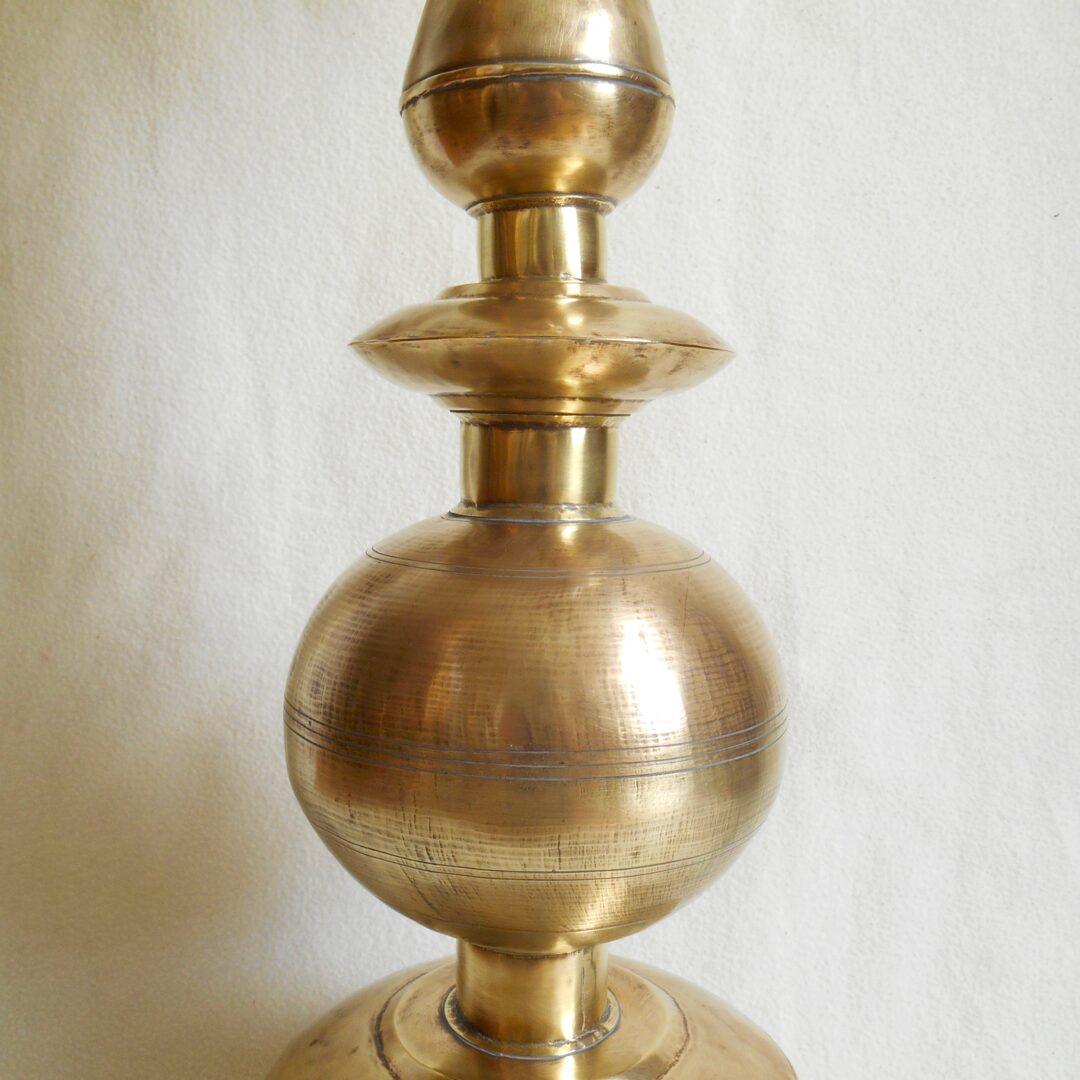 A brass rocket table lamp with a pearly glass shade by Fiona Bradshaw Designs