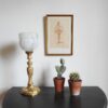A beautiful Art Deco brass table lamp with a marbled glass shade by Fiona Bradshaw Designs