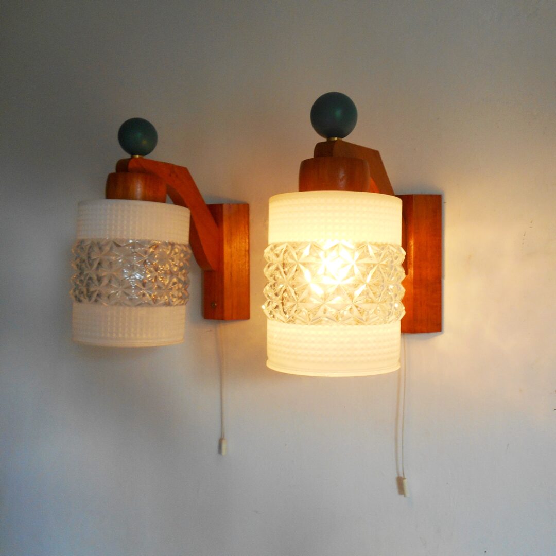 A pair of unique mid century modern teak wall lamps by Fiona Bradshaw Designs