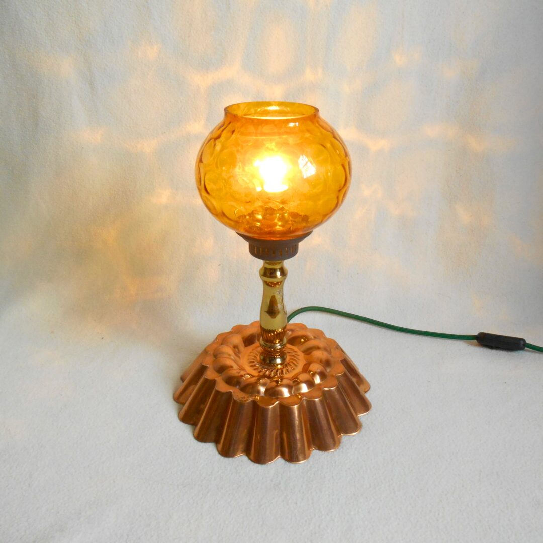 A bespoke copper jelly mould table lamp by Fiona Bradshaw Designs