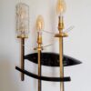 A Mid Century Modern wall sconce by Fiona Bradshaw Designs