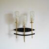 A Mid Century Modern wall sconce by Fiona Bradshaw Designs